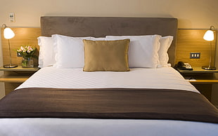 empty bed with brown pillow over white pillows HD wallpaper